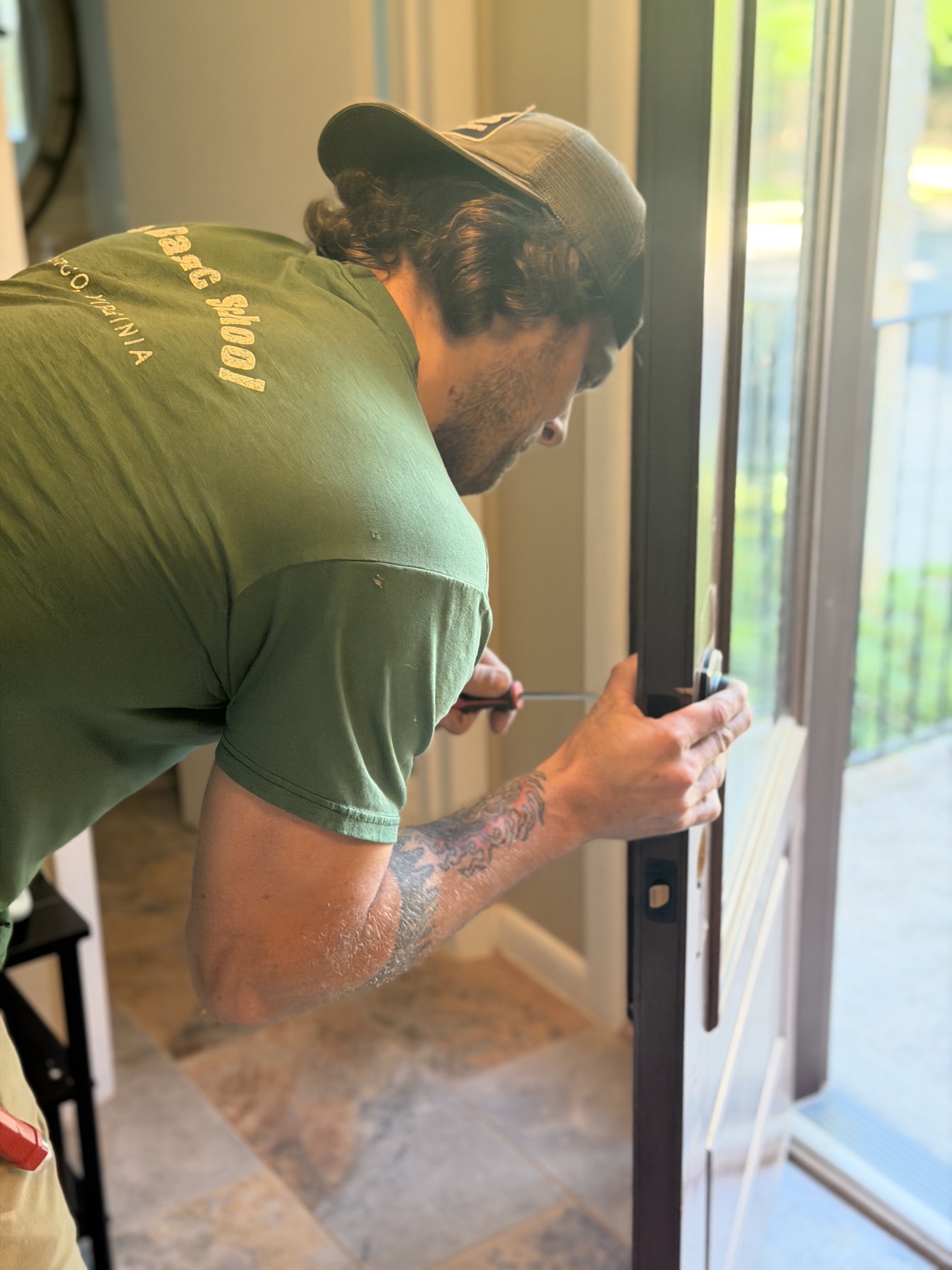 Brandon doing a handyman door repair in Northern Virginia